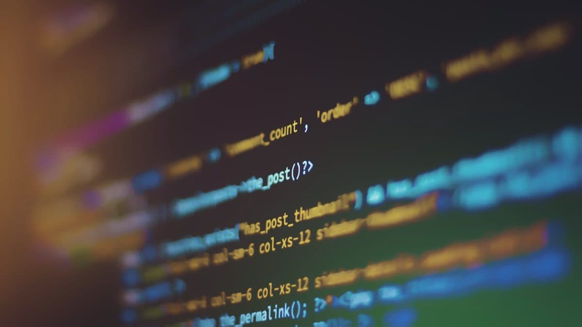 Lines of application code on a screen, shot at an angle so the detail falls away