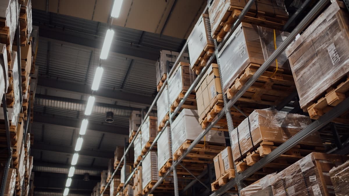 Warehouse racking stacked with palletised stock ready for bulk deployment